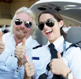Richard Branson with a Young Female Pilot